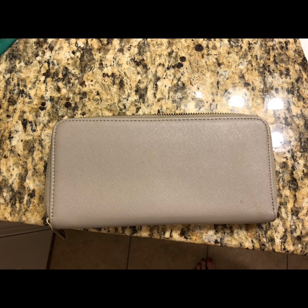 Grey full-zip wallet.
